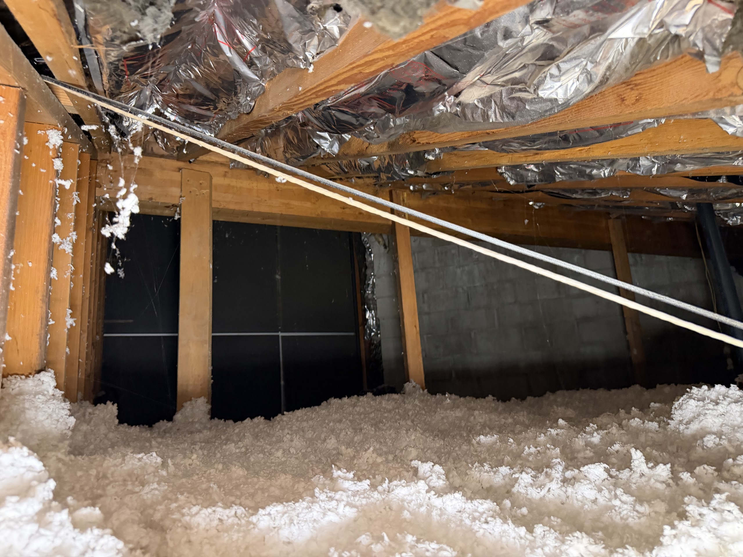 Before attic condition from Holladay before-and-after photo set 1