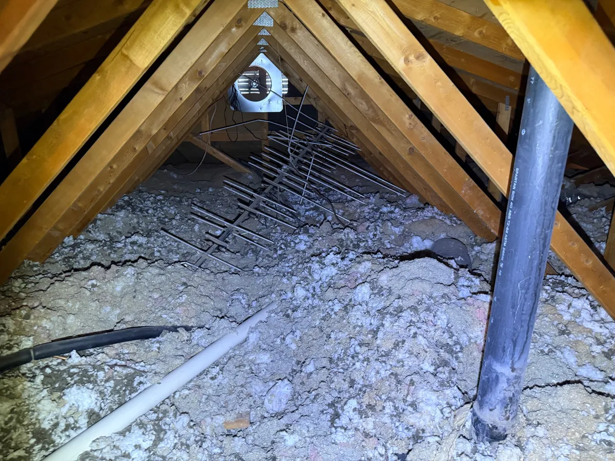 Before attic condition from Sandy before-and-after photo set 3